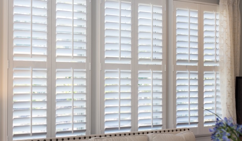 Faux wood plantation shutters in Destin